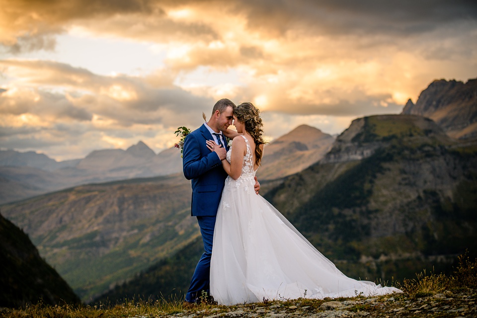 Perfect Lakeside elopement at Rising Sun along St. Mary Lakeshore in Glacier National Park surrounded by friends and family.,Mountain Wedding,Adventure Elopement