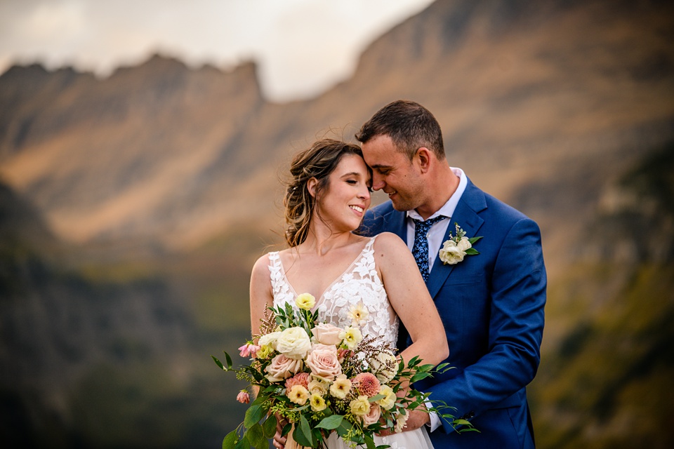 Perfect Lakeside elopement at Rising Sun along St. Mary Lakeshore in Glacier National Park surrounded by friends and family.,Mountain Wedding,Adventure Elopement