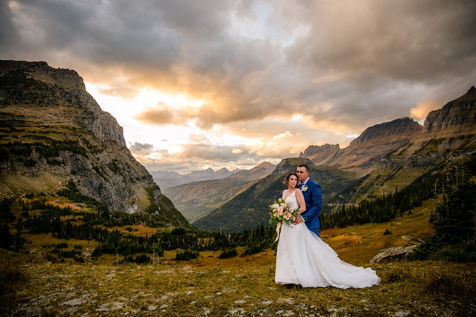 Perfect Lakeside elopement at Rising Sun along St. Mary Lakeshore in Glacier National Park surrounded by friends and family.,Mountain Wedding,Adventure Elopement