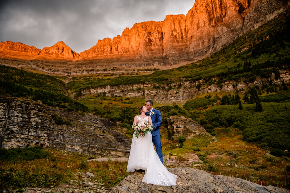 Perfect Lakeside elopement at Rising Sun along St. Mary Lakeshore in Glacier National Park surrounded by friends and family.,Mountain Wedding,Adventure Elopement