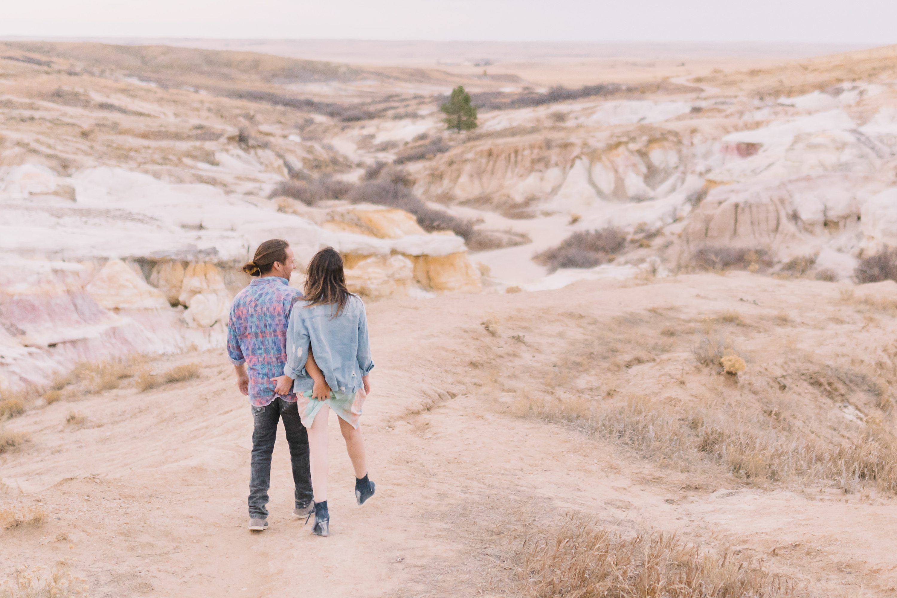 Megan + Eric  Denver Broncos Stadium Engagement Photos - Denver Wedding  Photographers - Elevate BlogDenver Wedding Photographers – Elevate Blog